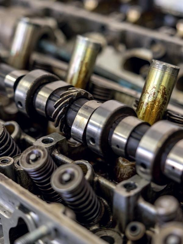 Close-up of a camshaft seated in a cylinder head