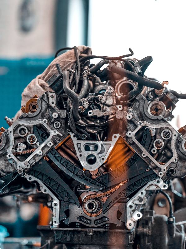 A V engine on the bench with its timing chains exposed