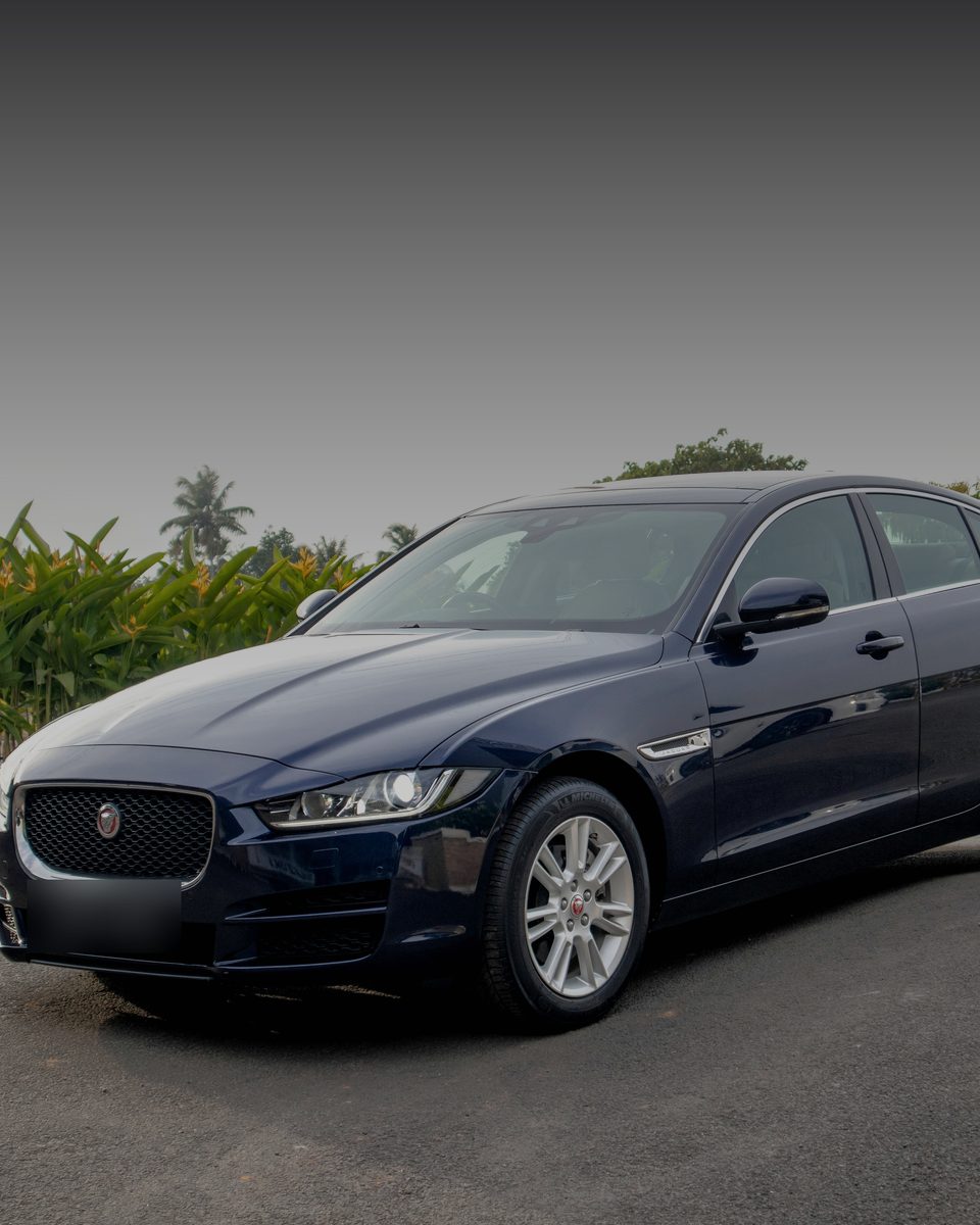 A Jaguar XE, front three-quarter view
